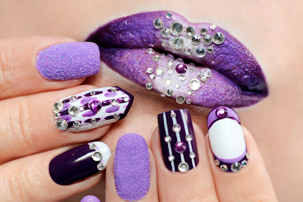 purple-nail-design-lip-makeup-with-rhinestones-closeup